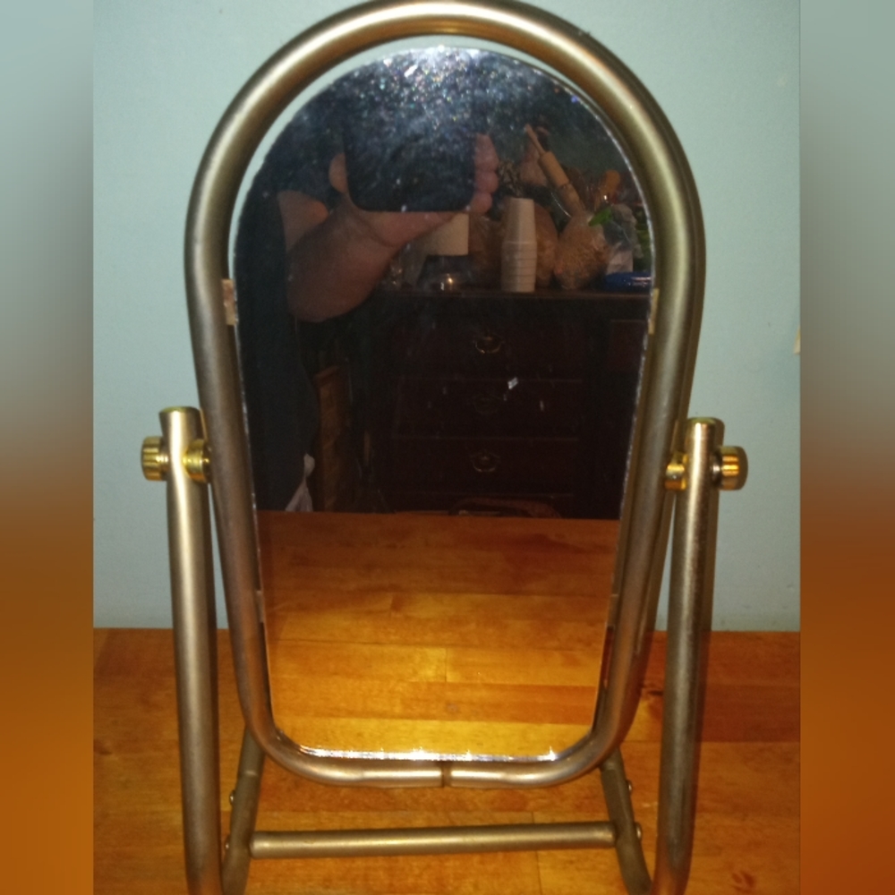 Vintage 1ft tall standing mirror on frame. Metal frame, Unique Brass style frame